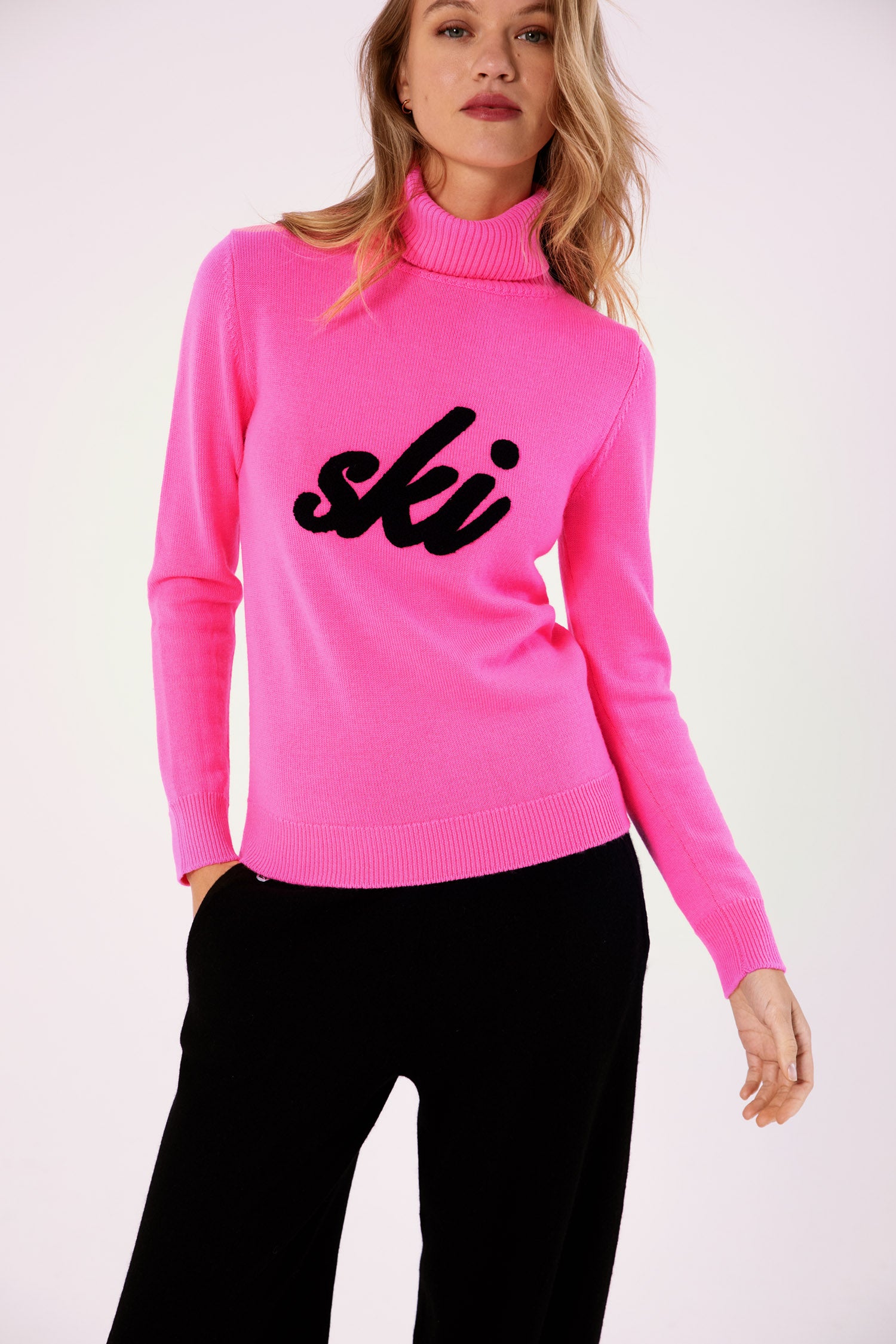 The SKI Sweater in Neon Pink