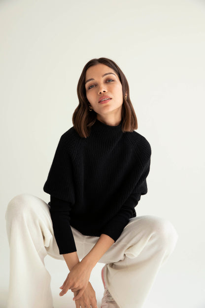 The Cashmere Slouchy Rib Turtleneck in Black