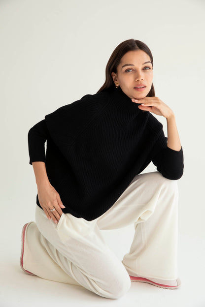 The Cashmere Slouchy Rib Turtleneck in Black